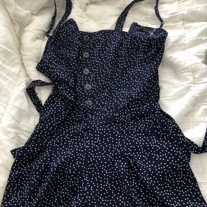 navy blue polka dot romper
